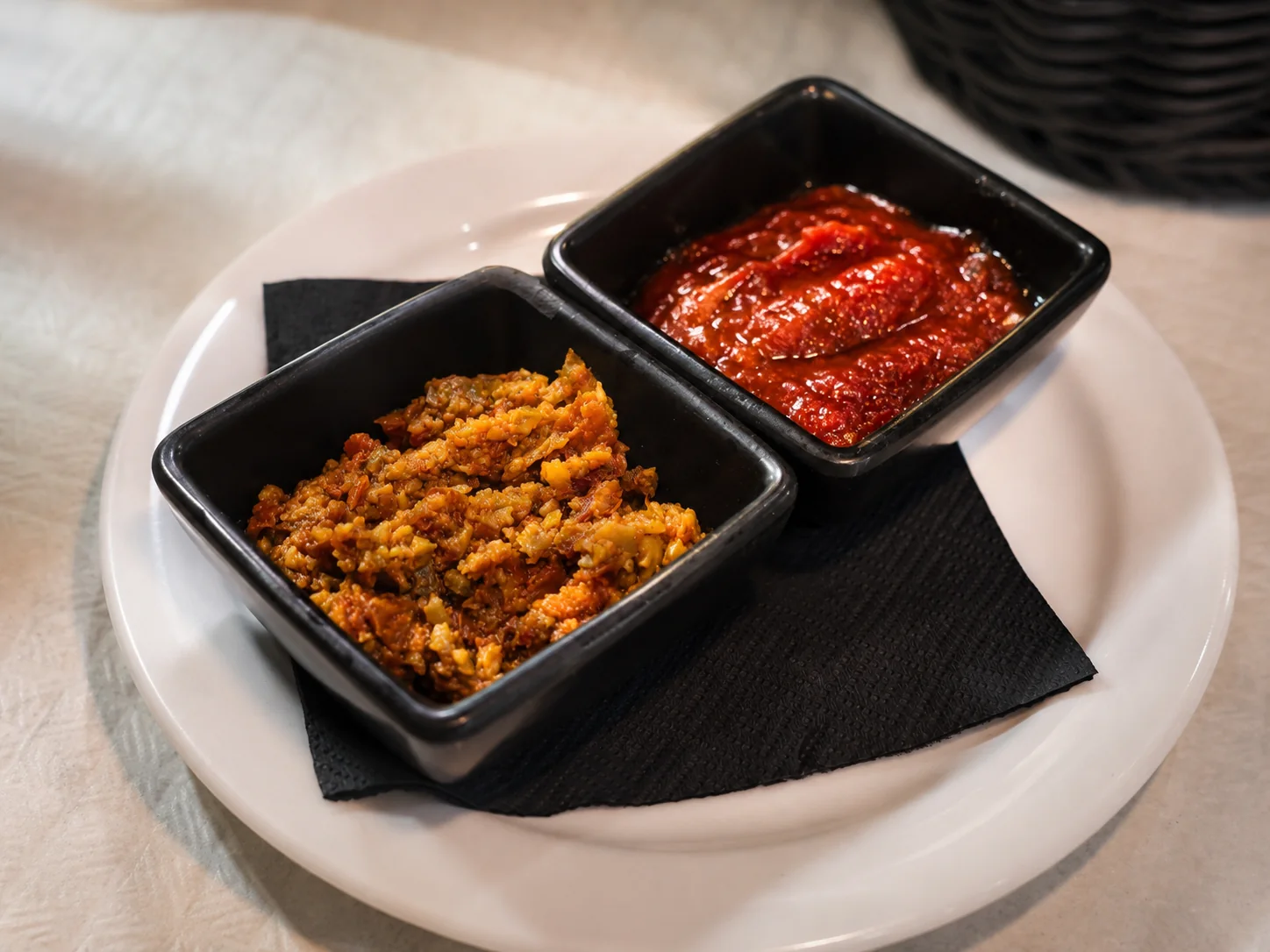 Two house-style accompaniments served with bread at Ferdie's